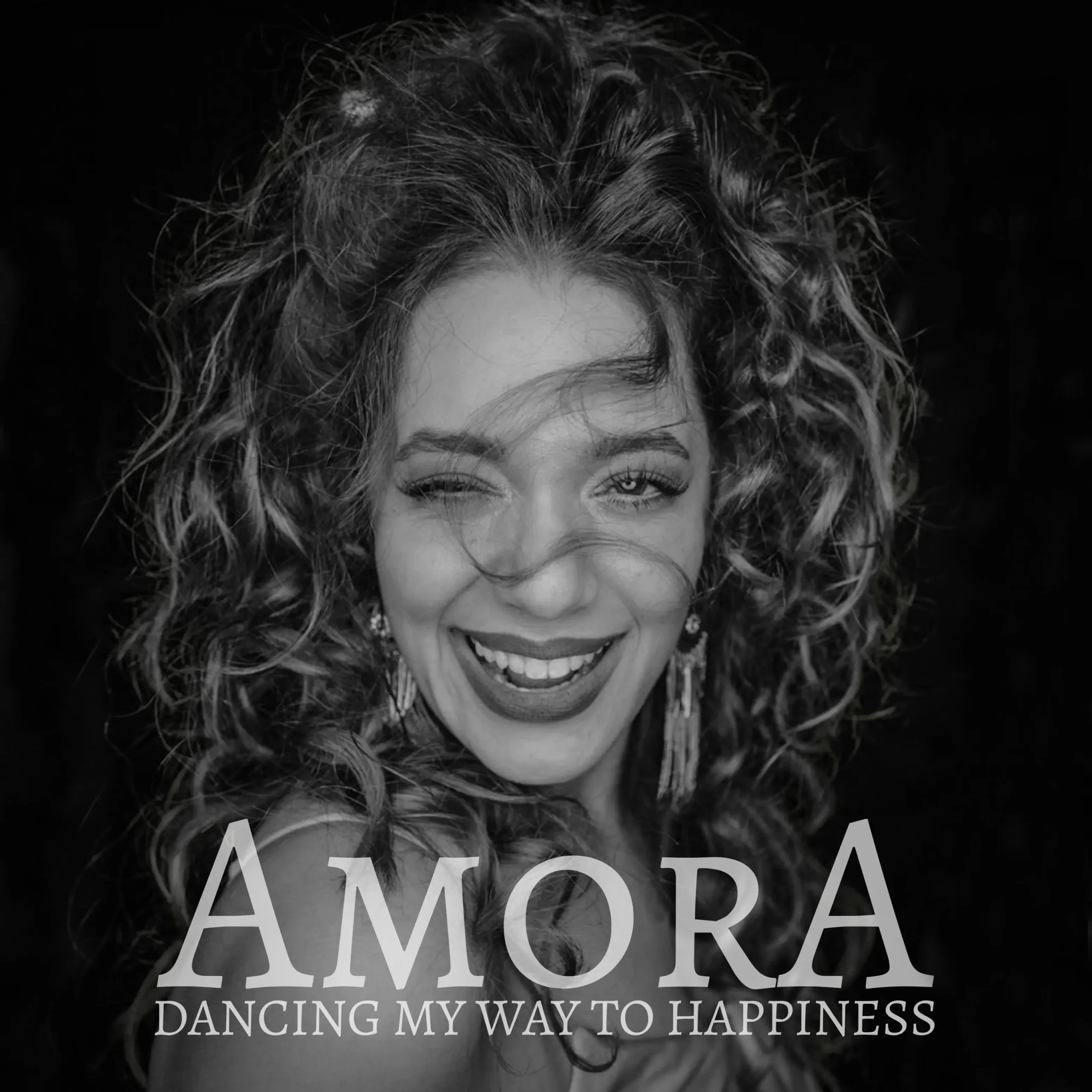 With Dancing My Way to Happiness, AmorA Essentially Said “Fine. I’ll Make My Own Universe. With Neon. And Synths.”